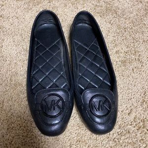 MK black flats